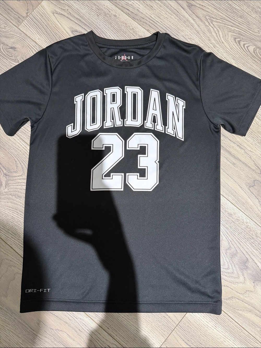 Jordan Black Short-Sleeve Tee with White 'JORDAN 23' Graphic
